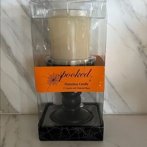 Flameless Candle with Pedestal Base - Cream and Black Halloween themed